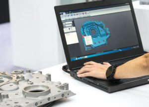 The man works in the CAD software